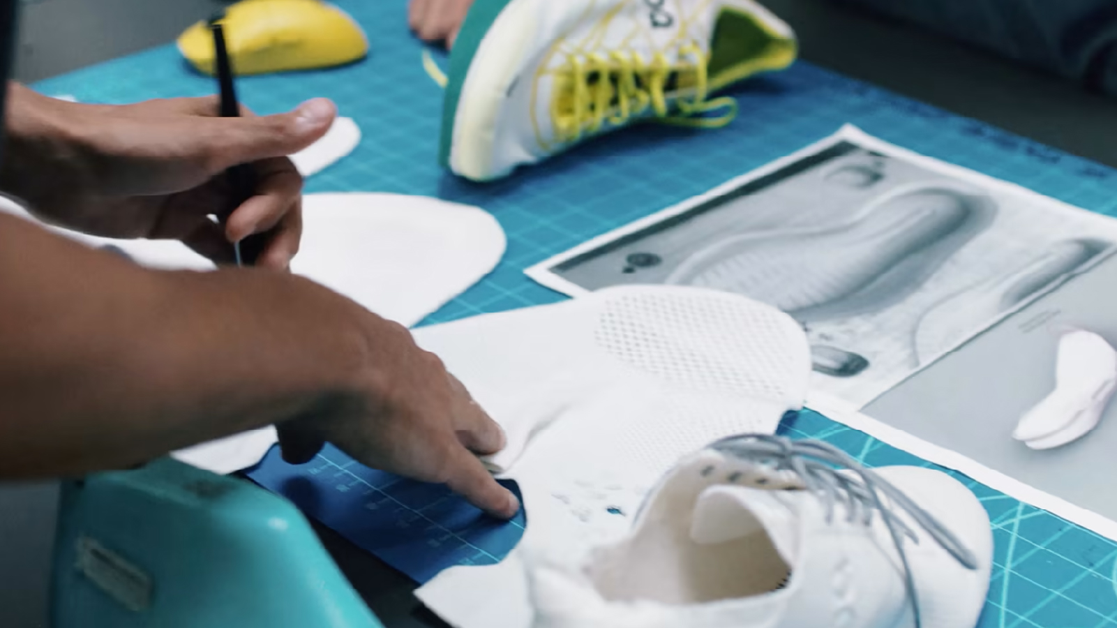 An image of someone designing a shoe