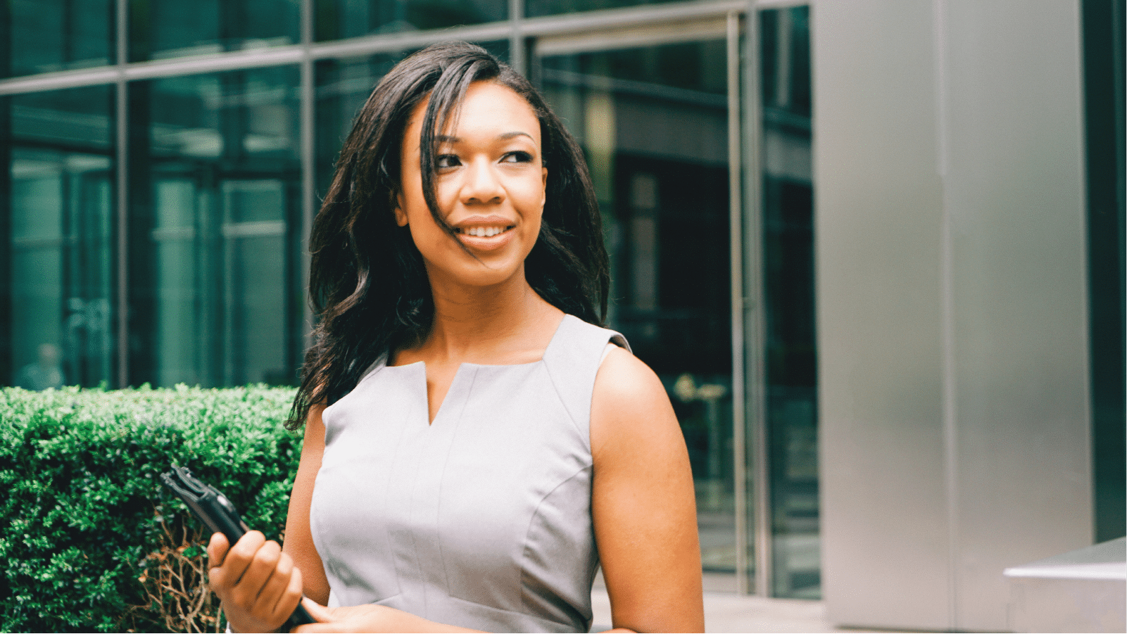 Black woman dressed in business attire