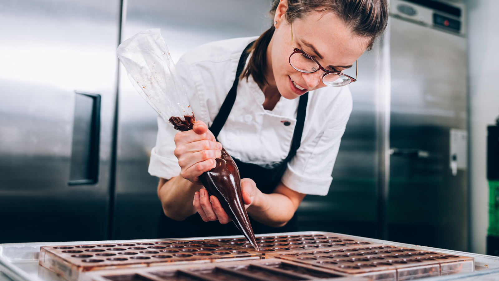 A chief making chocolate