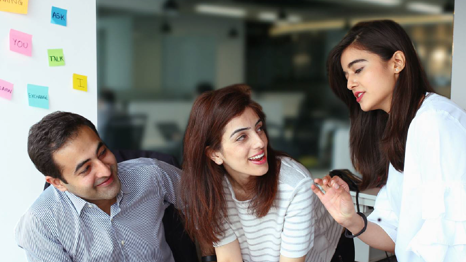 L’Oréal cemployees working in the office