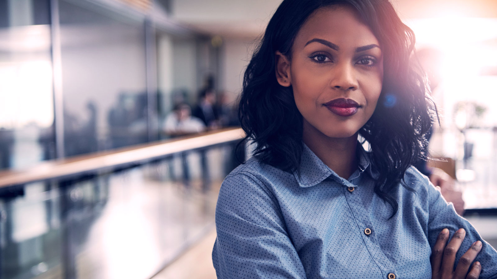 Business woman looking at camera with determination