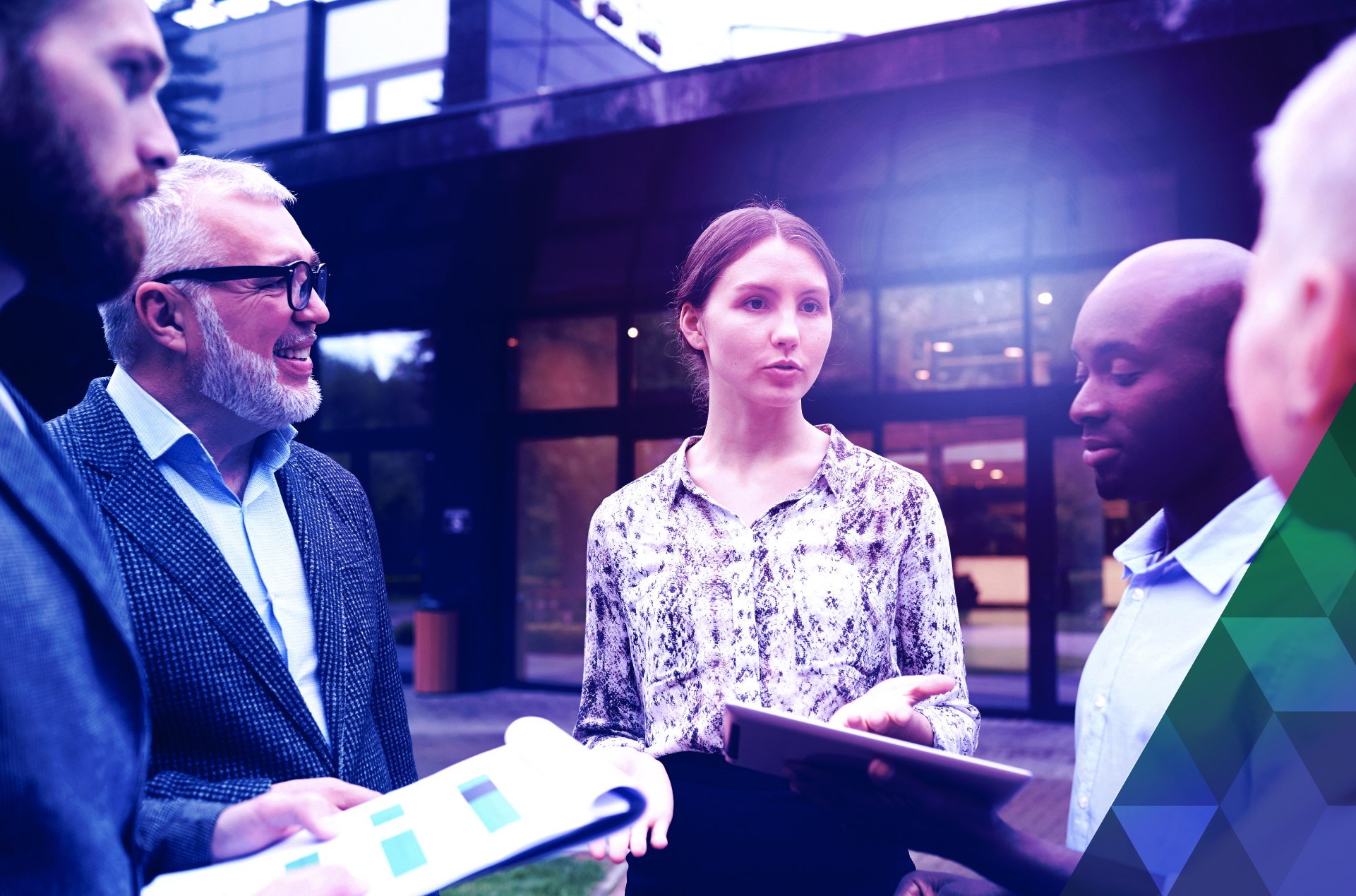 Group of professionals speaking to each other