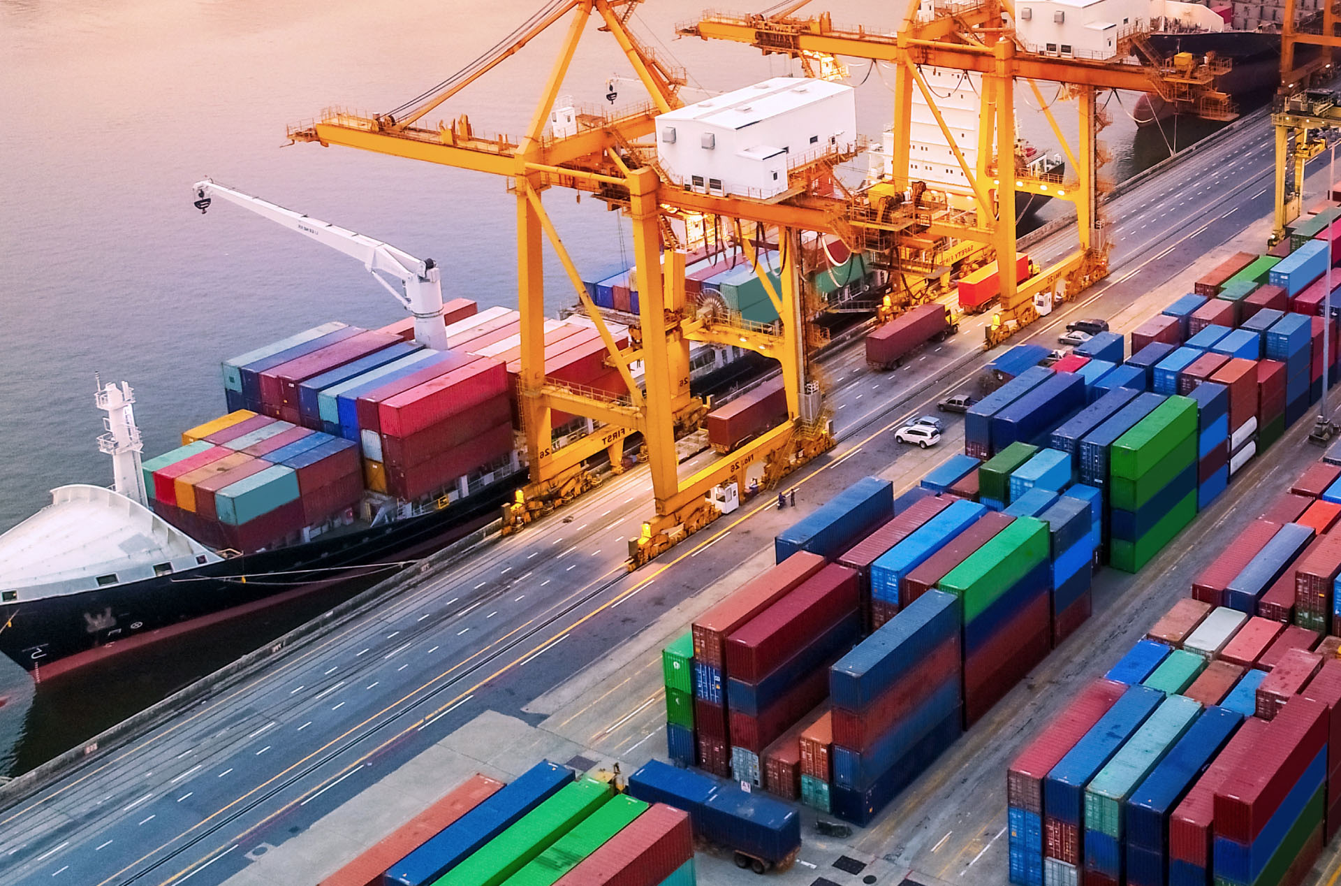 Shipping containers at a dock, shot from almost isometric angle