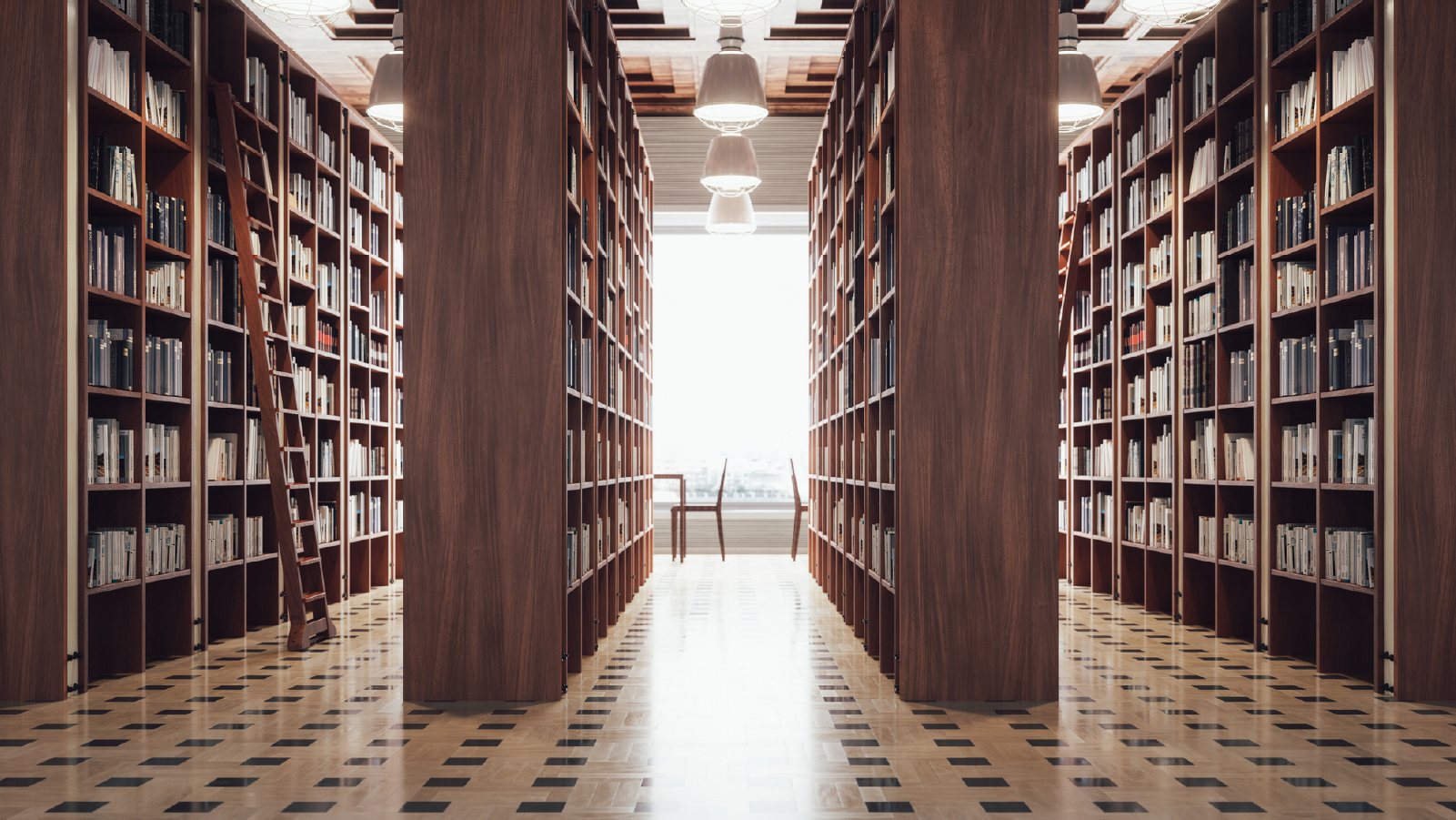 A long row of bookshelves filled with books, creating a serene atmosphere in a library setting.