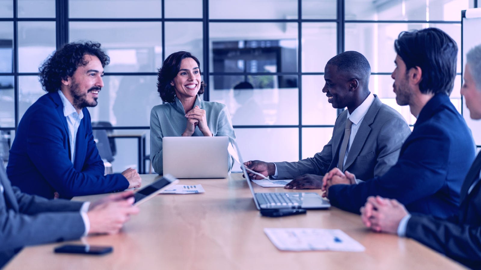 A group of team meeting in a conference room