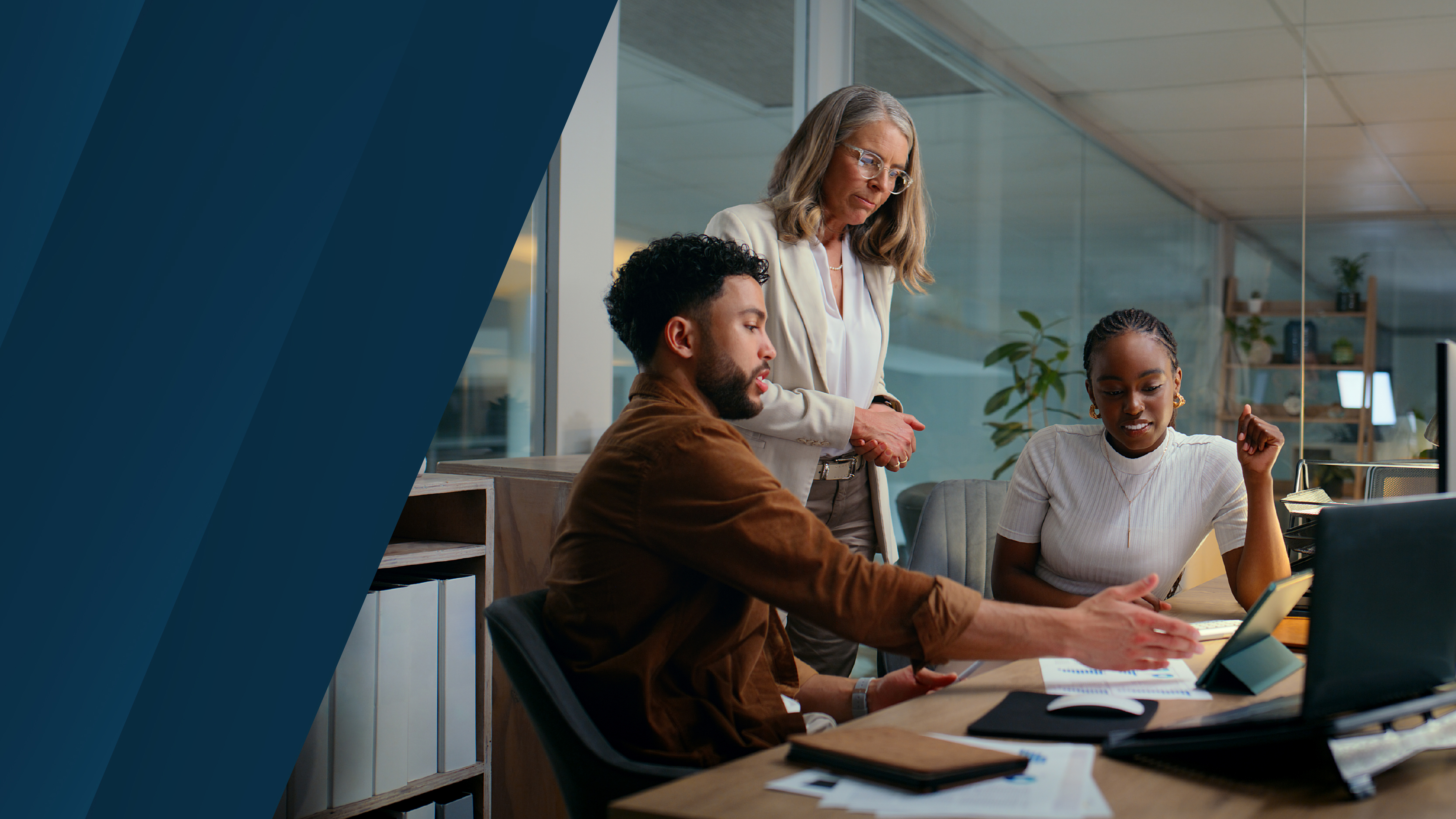  Anaplan webinar on "Debunking the myths: The role of autonomous finance in close and consolidation." The text highlights insights on autonomous finance, with an image of three professionals collaborating in an office setting, discussing data on a laptop.